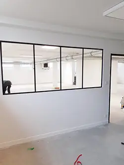 Installation de verrière intérieure pour une maison de santé
